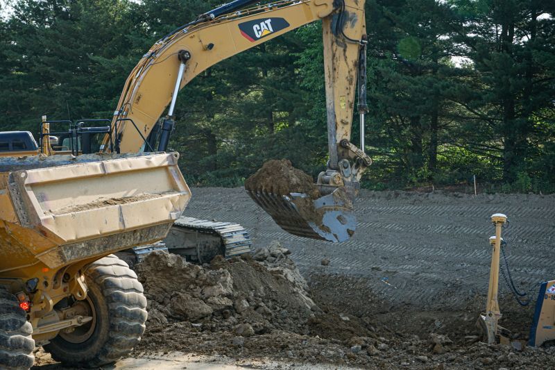 excavator digging a hole