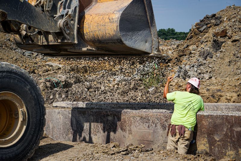 construction equipment moving dirt and gravel