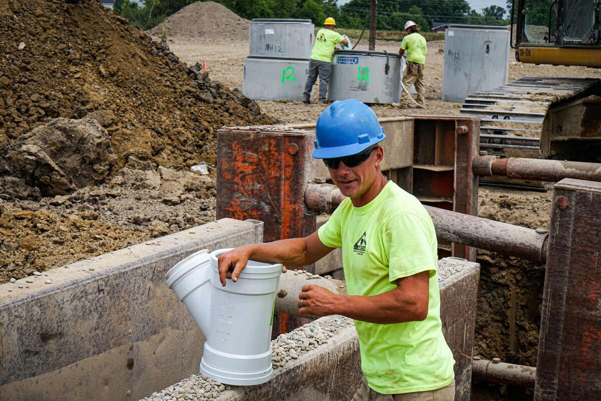 man smiling on construction site